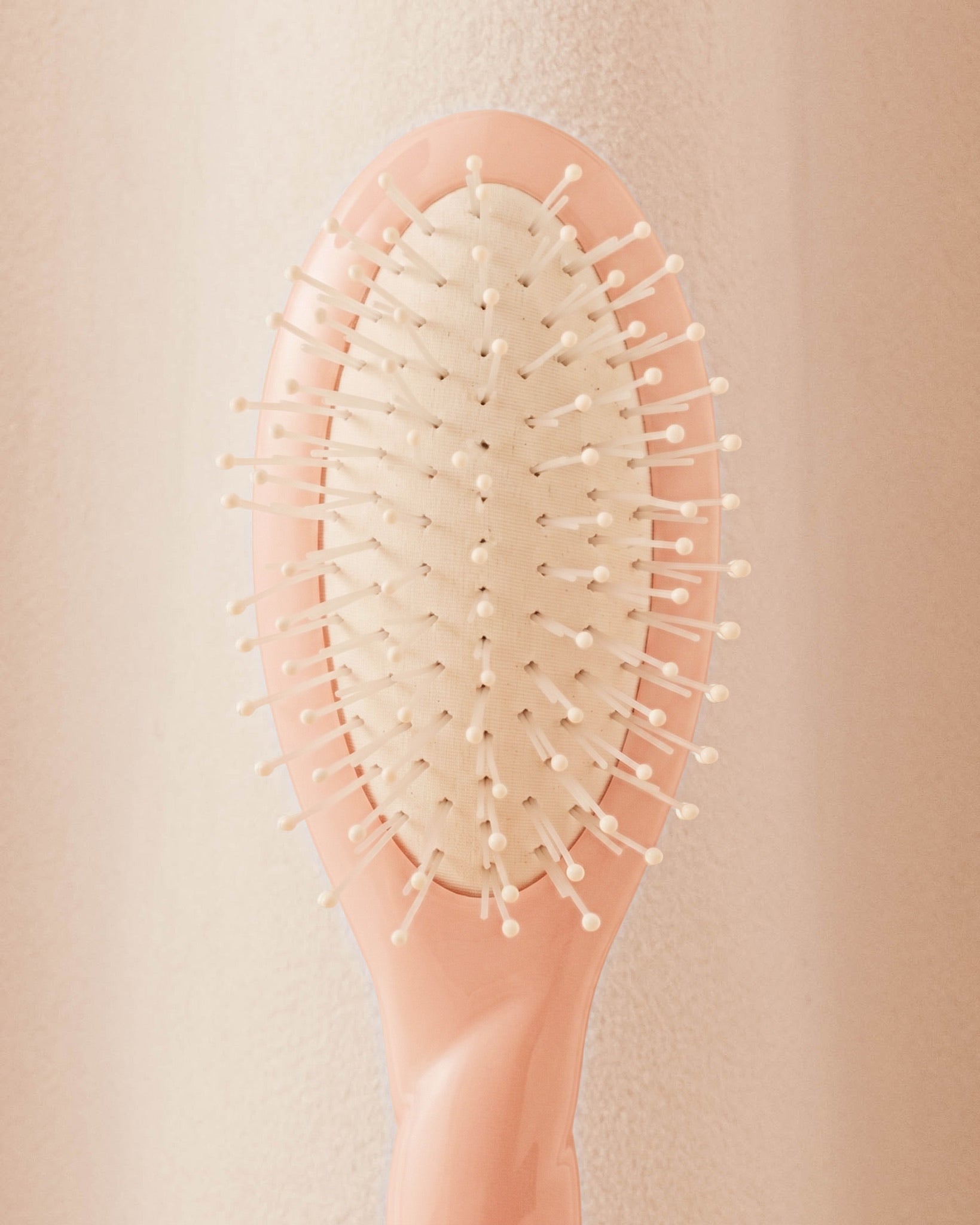 N.04 La Micro Brosse Démêlante & Massante La Miracle Rose Poudré